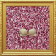 A bra sewn on dozens of crumpled Chinese banknotes featuring the face of Mao Zedong, by Chen Guang.